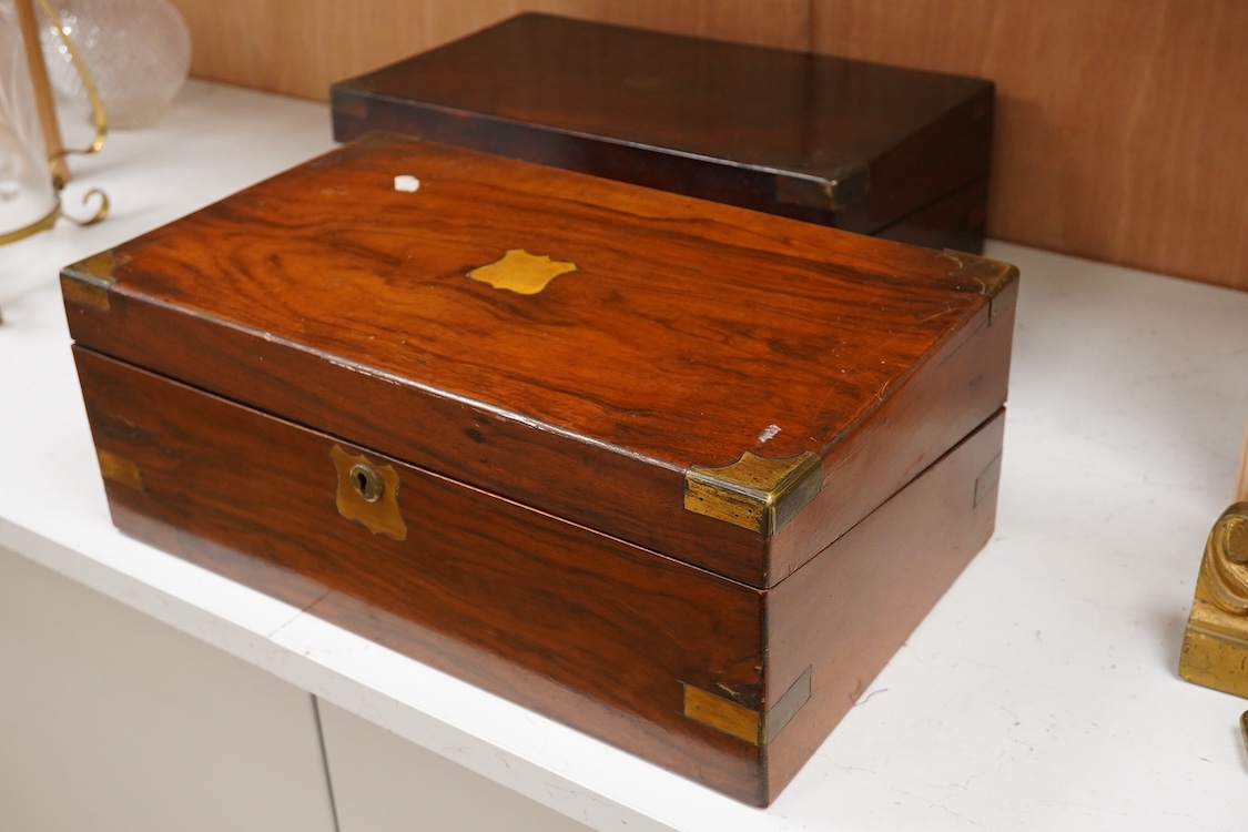 A Victorian walnut rising slope together with a rosewood writing slope